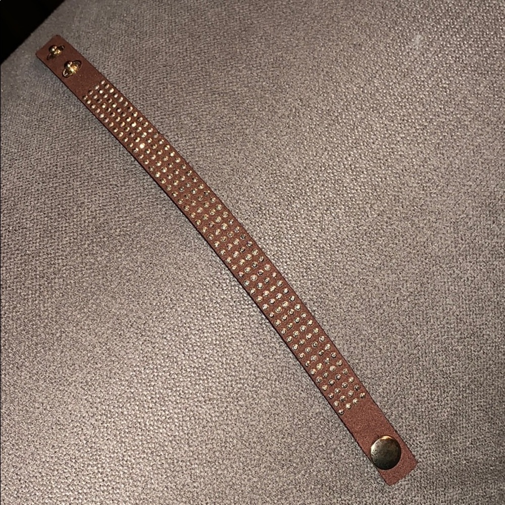 Brown bracelet with gold rhinestones